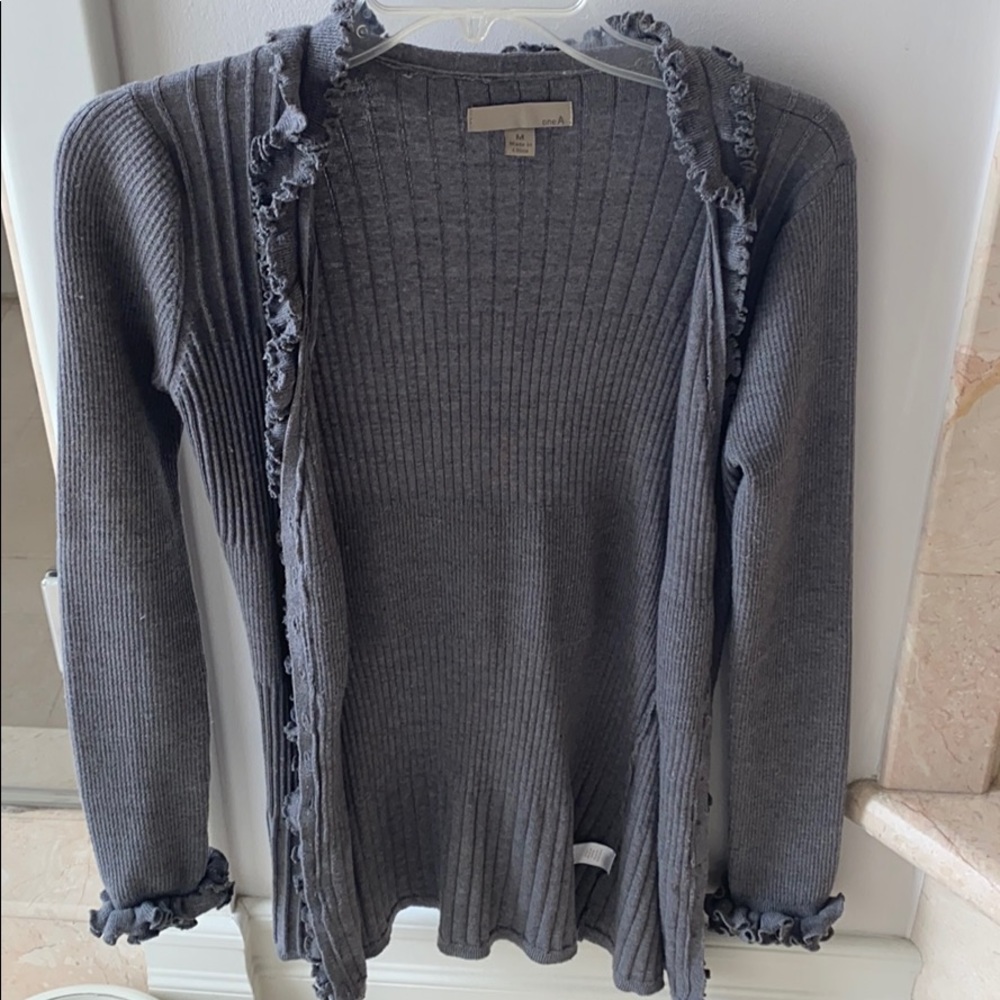 Grey oneA cardigan with ruffles